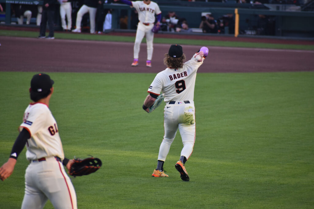 The Giants new centerfielder, Harrison Bader fields a ball in center field. 