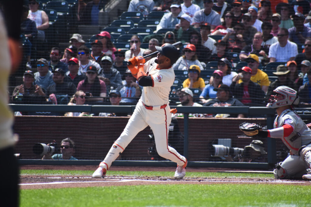 Luis Arraez hits a triple against Aaron Nola