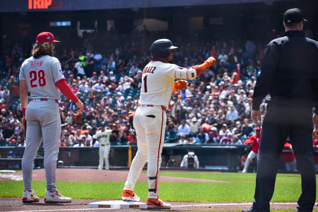 Luis Arraez celebrating after hitting a triple at Oracle Park