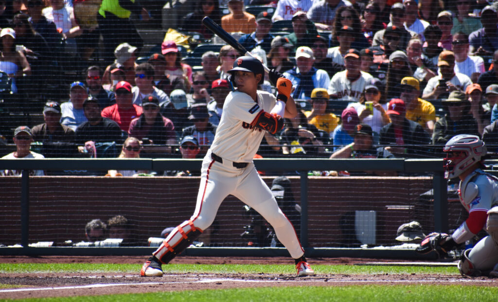 Jung Ho Lee awaiting a pitch from Aaron Nola