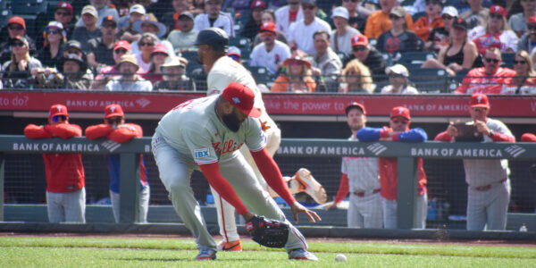 Phillies pitcher makes error while fielding a ground ball