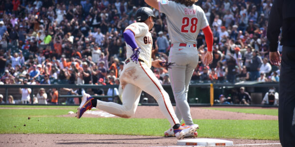 Willy Adames rounding third base at Oracle Park