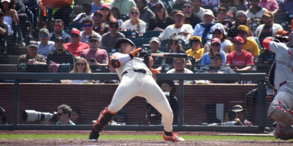 Jung Hoo Lee dodging a ball at home plate, Giants vs Phillies, Oracle Park April 2026