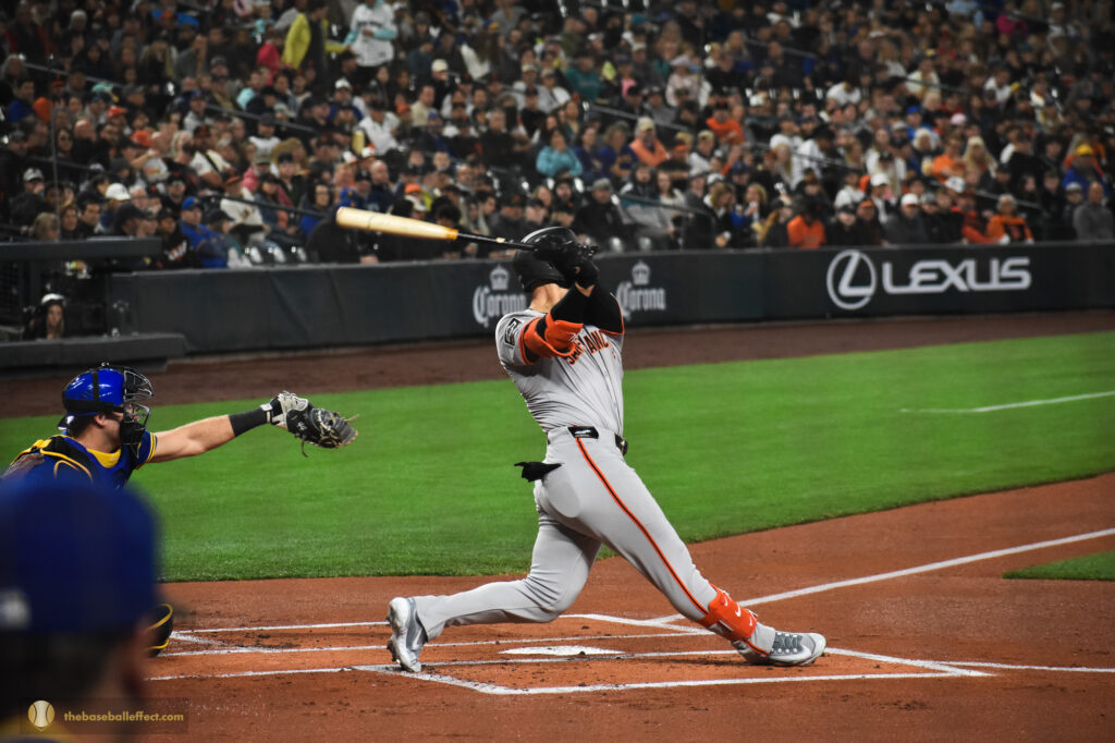 Michael Conforto swings at a pitch from Luis Castillo