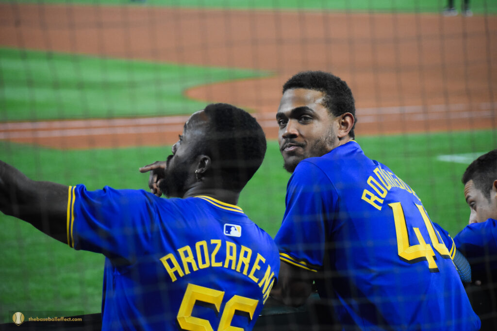 Julio Rodriguez and Randy Arozarena chatting it up in the dugout, Giants - Mariners, T-Mobile Park 2024