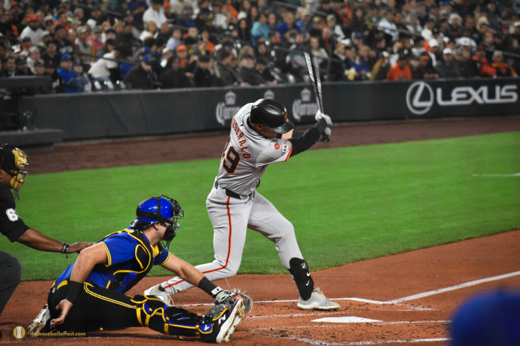 Fitzegerald chases a pitch down and away, T-Mobile Park 2024