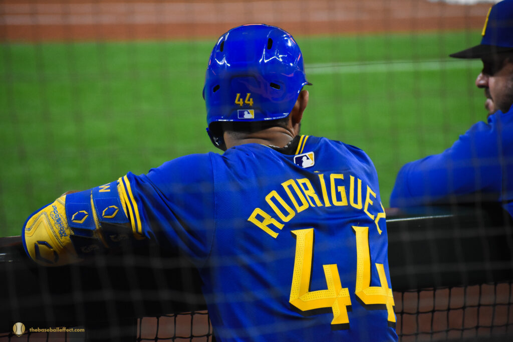 Julio Rodriquez with his helmet on in the dugout, T-Mobile Park 2024