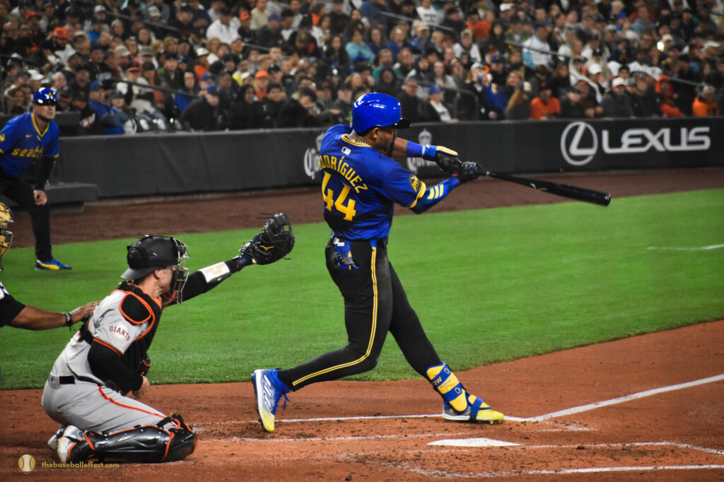 Julio Rodriguez mid swing, T-Mobile Park 2024