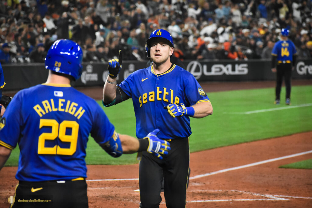 Cal Raleigh greets Luke Raley after a homerun, T-Mobile Park 2024