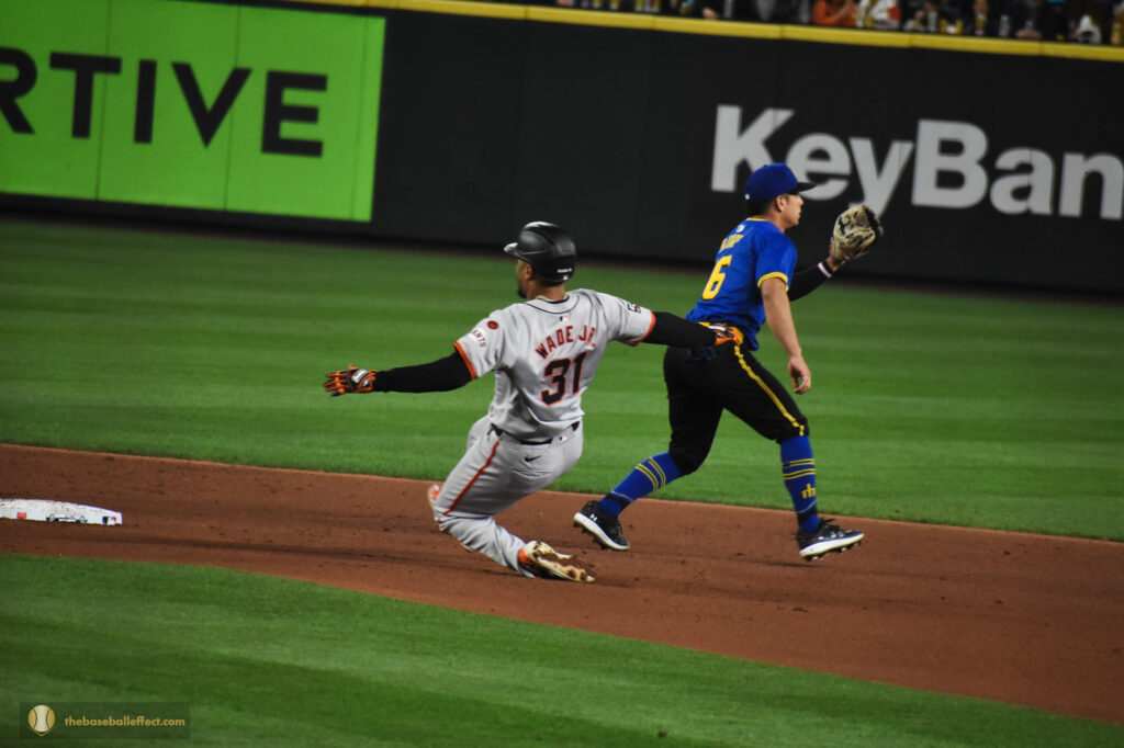 Lamonte Wade Jr. slides into second base, T-Mobile Park 2024