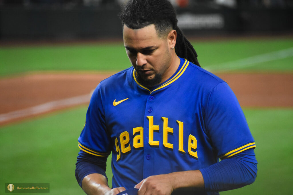 Luis Castillo contemplates his pitching as he exits the mound, T-Mobile Park 2024