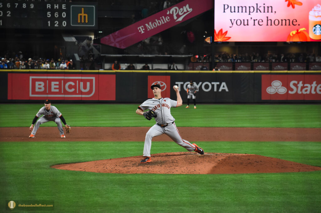 Taylor Rogers delivers a pitch to home plate, T-Mobile Park 2024
