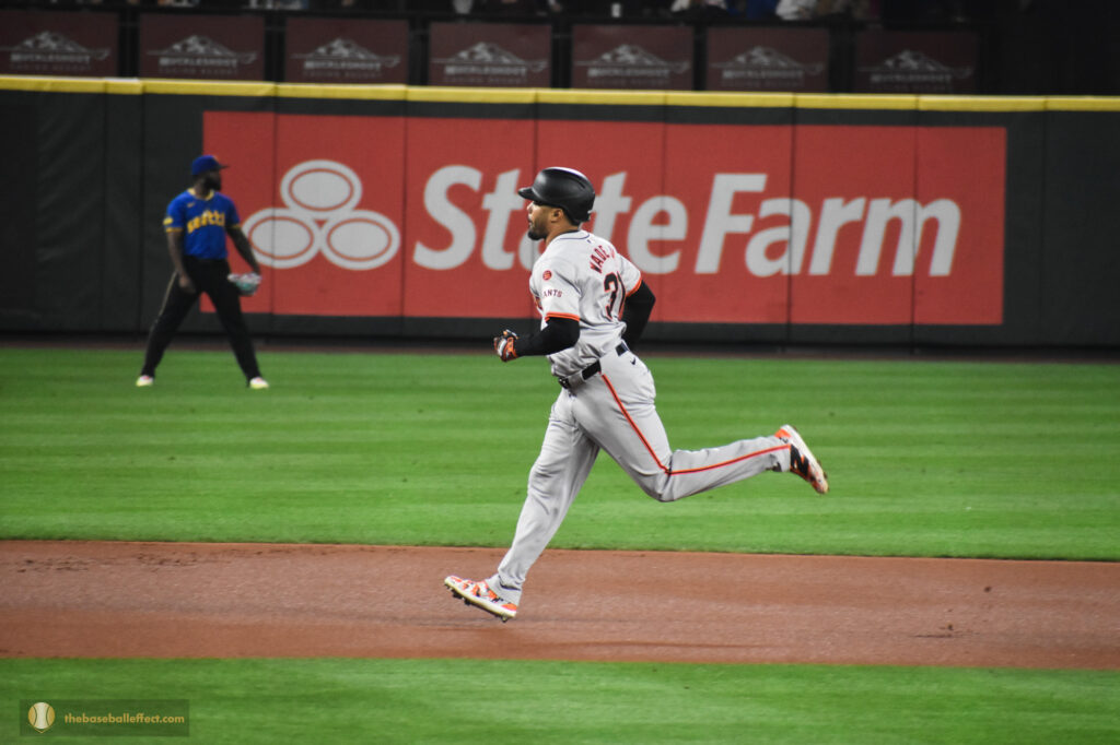 Lamonte Wade Jr. trots around the bases after hitting a homerun off of Luis Castillo