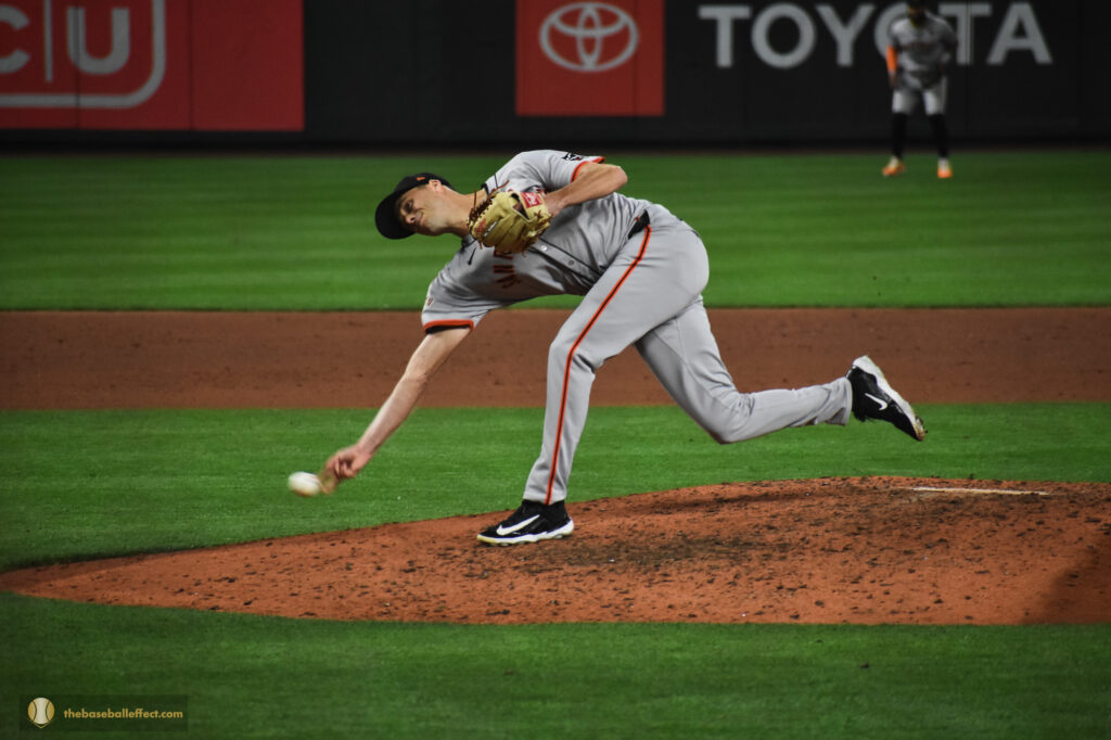 Tyler Rogers submarines a pitch toward homeplate, T-Mobile Park 2024